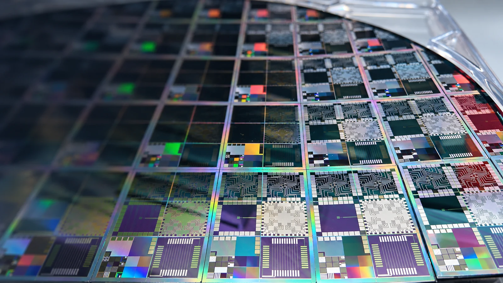 Editorially retouched photograph of a patterned semiconductor wafer